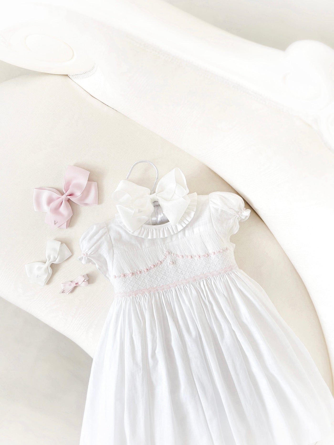 Beautiful traditional white smocked dresses for your little girl's portrait, heirloom photos, vignettes or christening, baptism, holy communions and other religious ceremonies Charlotte sy Dimby